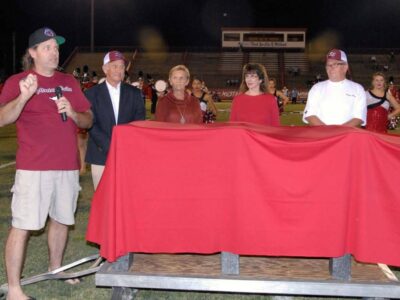 If Heaven Can Send Smiles, Coach Henderson Had a Big One Friday; Benches Dedicated in his Memory